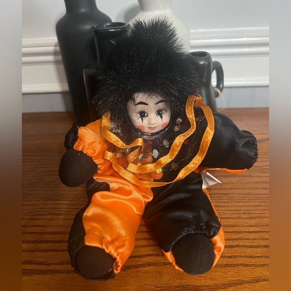 Black and Orange Clown Doll with Fur Hat
